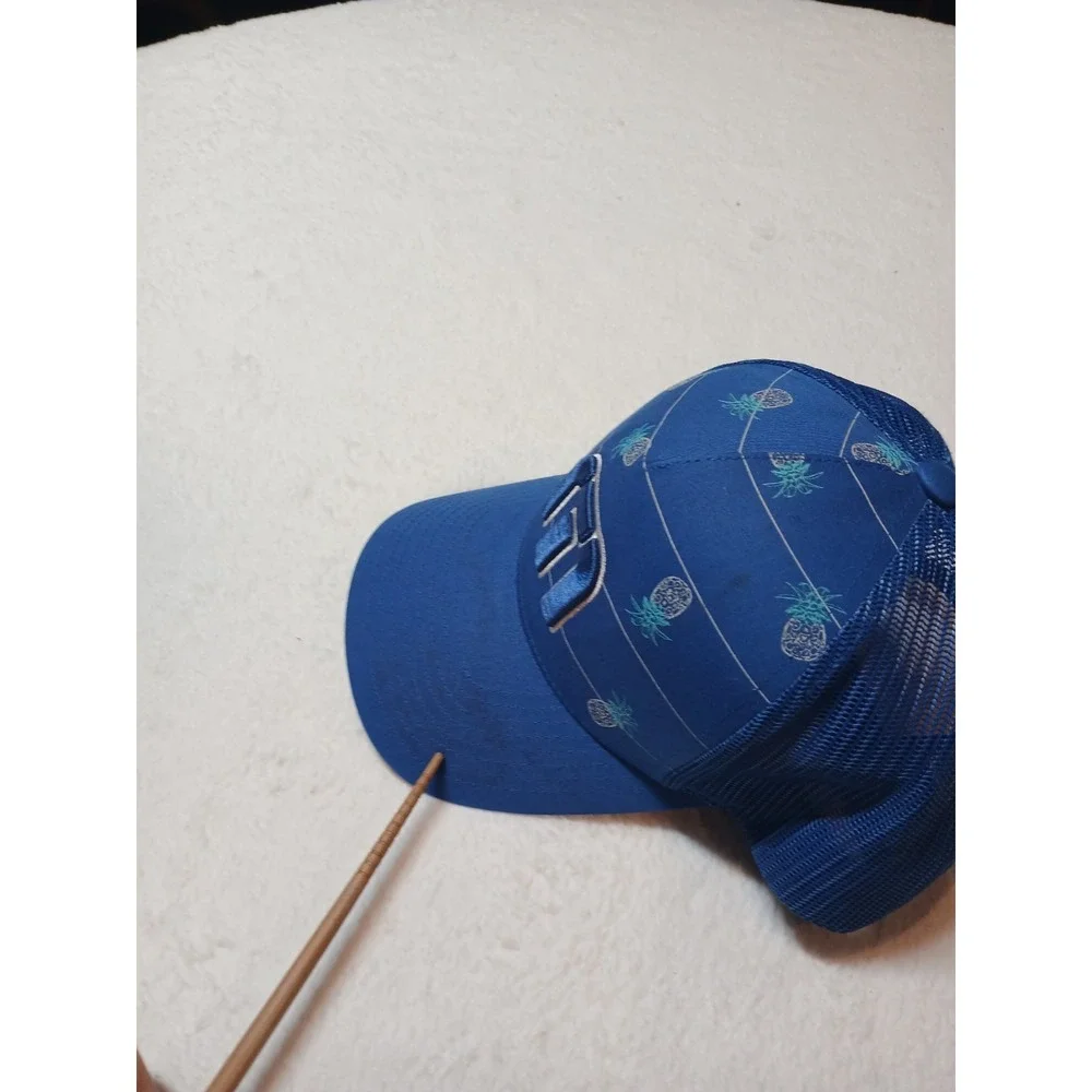 Travis Mathew Blue Pineapple Print Yupoong Adjustable Trucker Hat